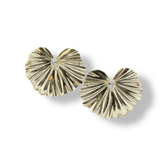 Pair of gold earrings on a white background